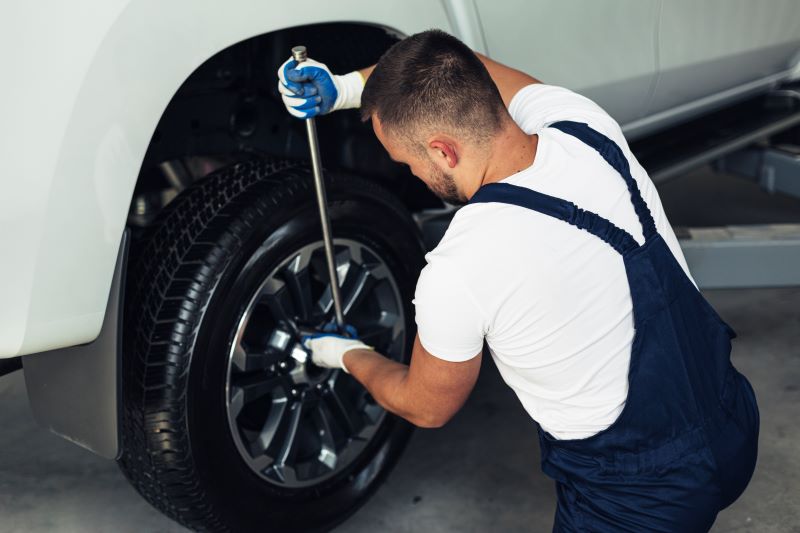 high-angle-male-mechanic-changing-car-wheels-1.jpg high-angle-male-mechanic-changing-car-wheels-1.jpg