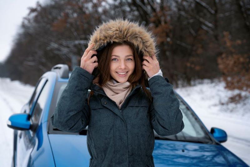 smiley-woman-holding-jacket-medium-shot_1-1.jpg